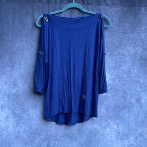 Women's blouse with slits on the sleeves